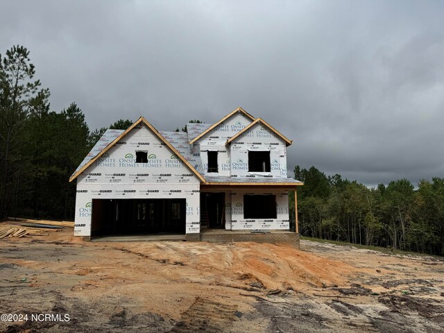 property in mid-construction featuring a garage