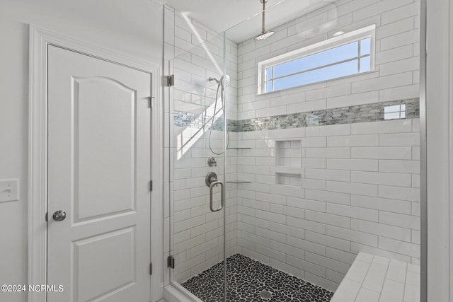 bathroom featuring walk in shower