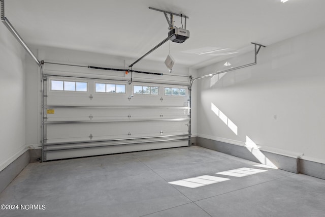 garage featuring a garage door opener