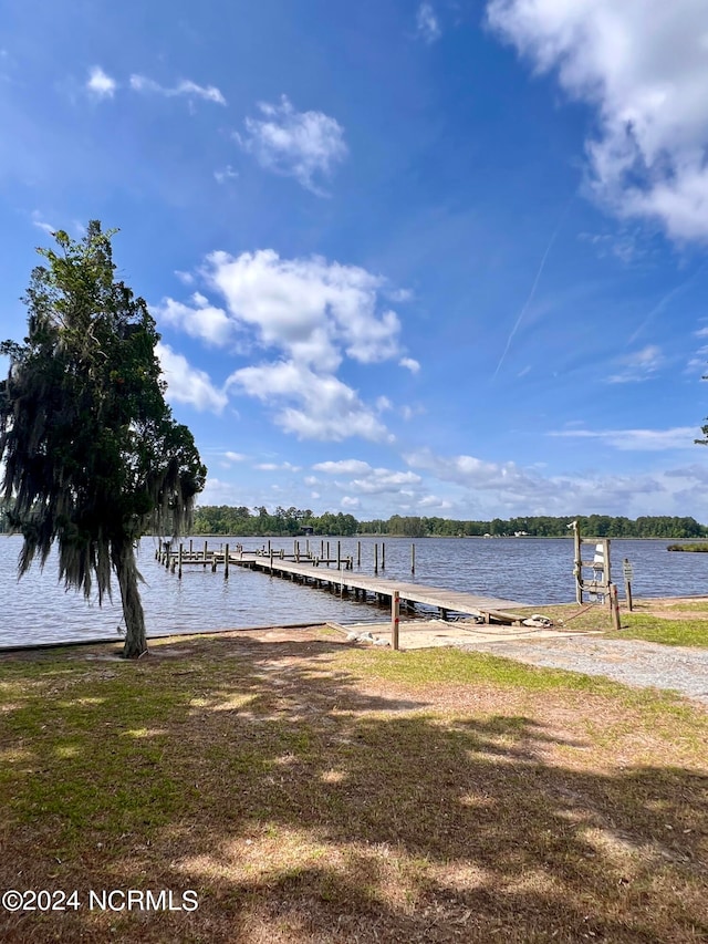 view of dock with a water view