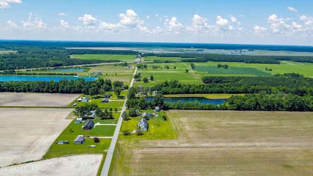 drone / aerial view with a rural view and a water view