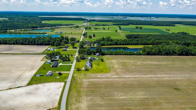 drone / aerial view featuring a rural view and a water view