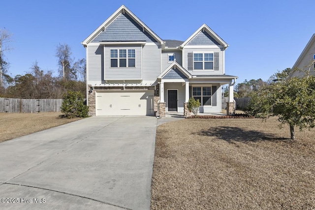 view of front of house with a porch and a garage