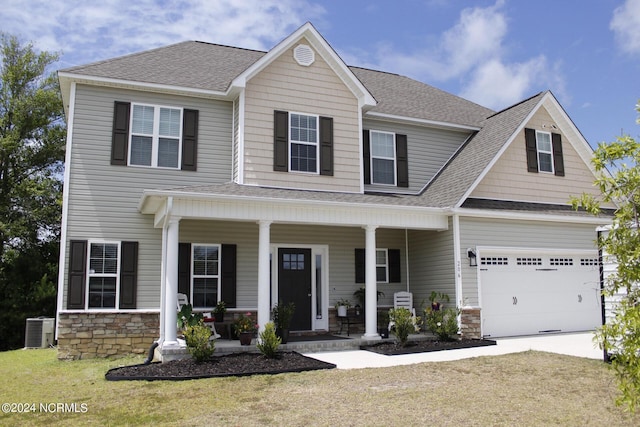 view of front facade featuring concrete driveway, a porch, roof with shingles, and central air condition unit