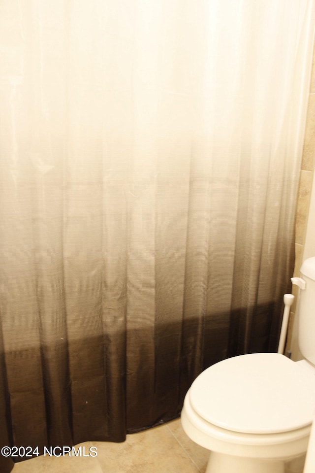 bathroom featuring tile patterned flooring