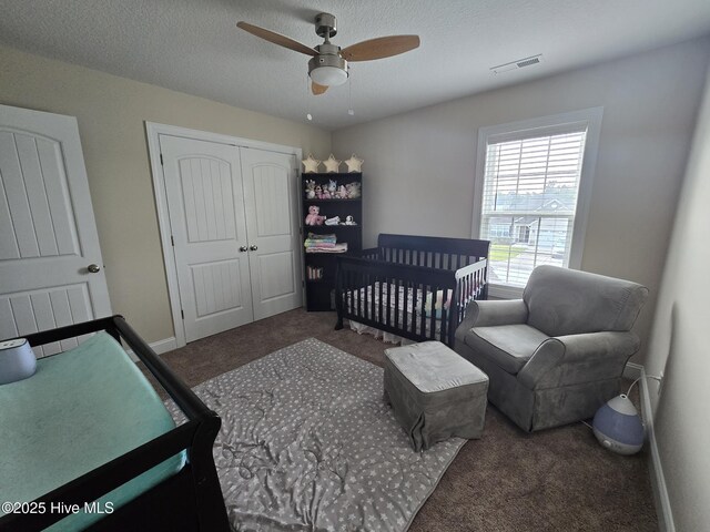 206 Messenger Ct, Jacksonville, NC 28546 - bedroom featuring carpet, a closet, a ceiling fan, a textured ceiling, and baseboards
