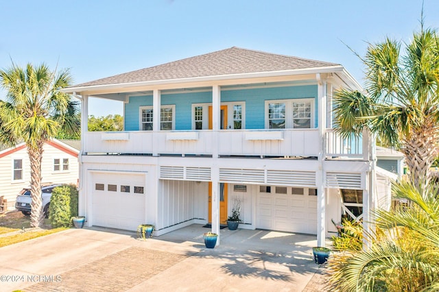 beach home featuring a garage