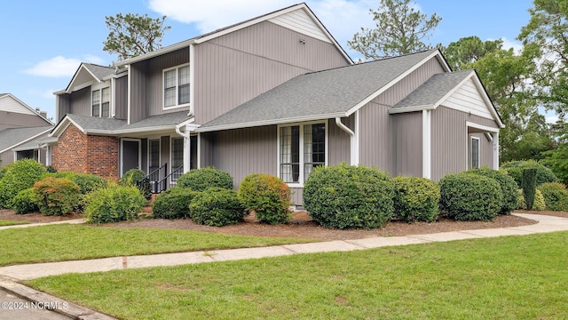 view of property with a front lawn