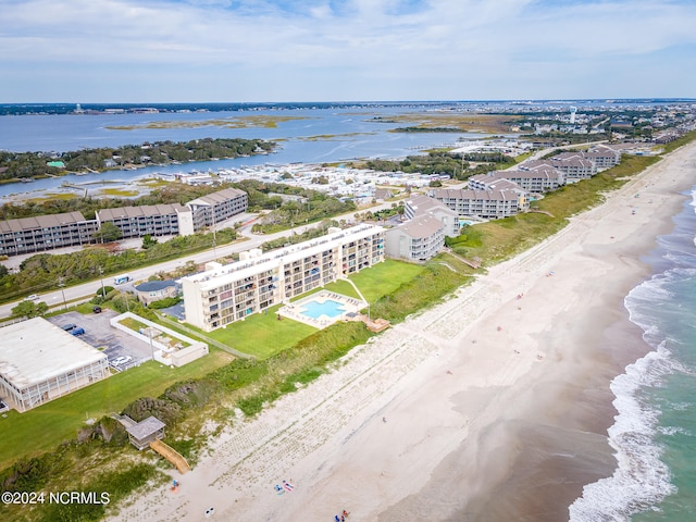 bird's eye view with a beach view and a water view