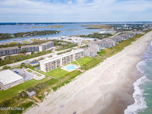 aerial view featuring a beach view and a water view