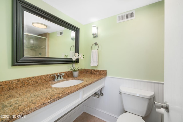 bathroom featuring sink and toilet