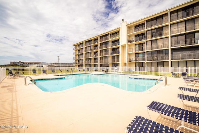 2305 W Fort Macon Rd Unit 107, Atlantic Beach, NC 28512 - community pool with a patio area