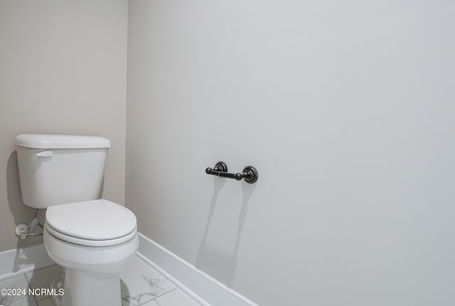 bathroom featuring toilet