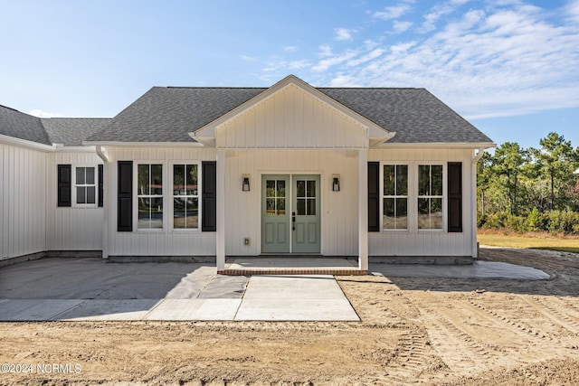 view of front facade with a patio area