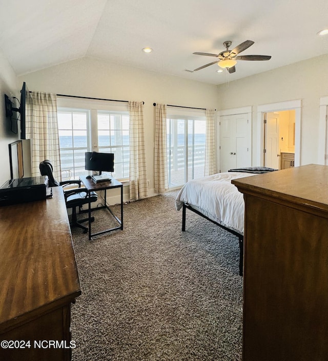 carpeted bedroom with ceiling fan and lofted ceiling