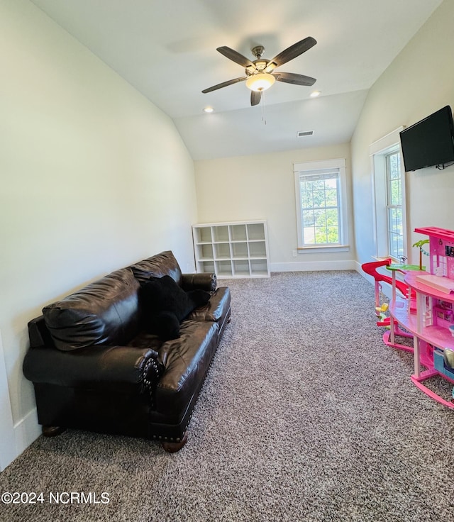 rec room featuring carpet floors, vaulted ceiling, and ceiling fan