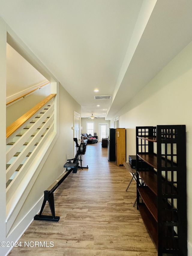 hall with light wood-type flooring