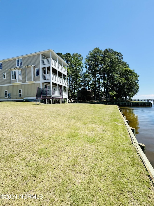 view of building exterior featuring a water view