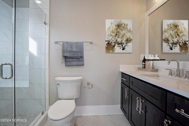 bathroom with tile flooring, an enclosed shower, toilet, and large vanity