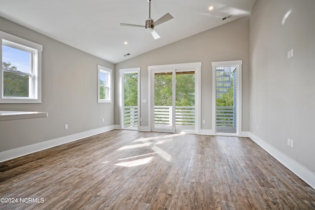 spare room featuring ceiling fan, dark hardwood / wood-style floors, and lofted ceiling