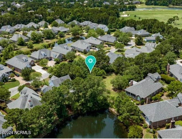 aerial view featuring a residential view and a water view