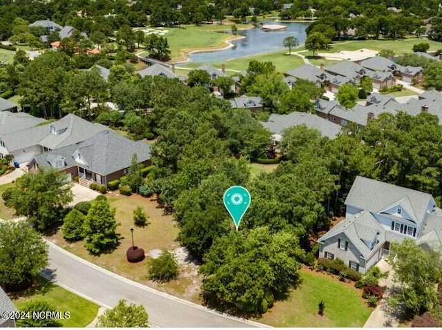 aerial view with a water view and a residential view