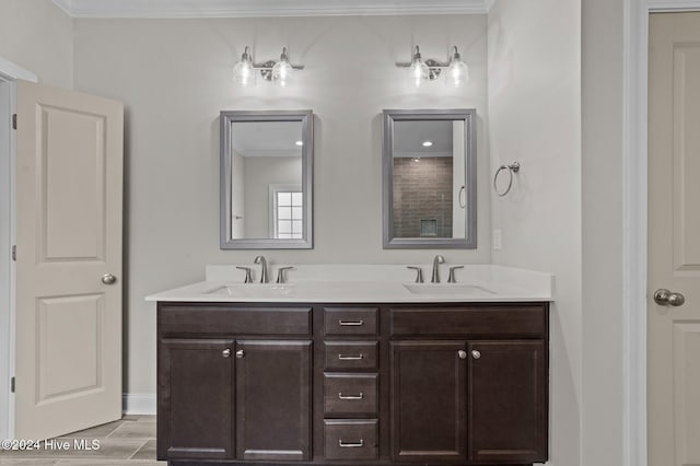 bathroom featuring vanity and ornamental molding