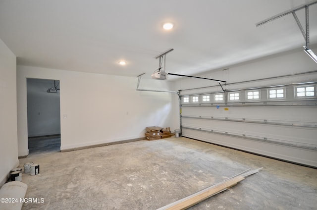 garage featuring a garage door opener