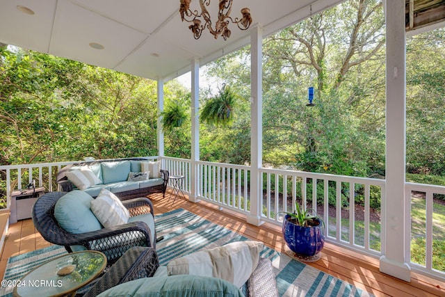 wooden terrace featuring outdoor lounge area