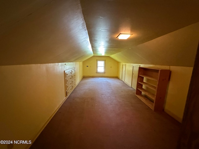 bonus room with vaulted ceiling