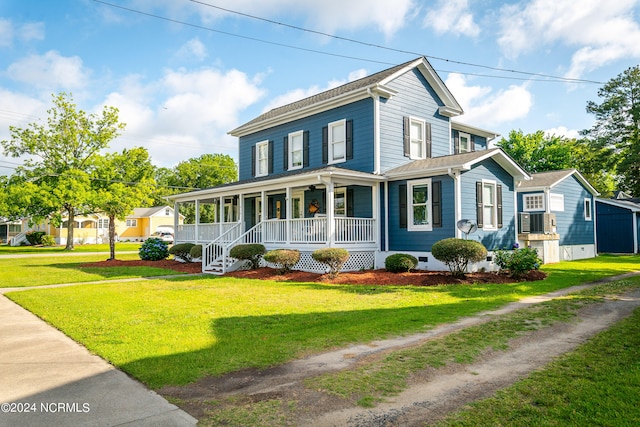 farmhouse inspired home with a porch and a front lawn