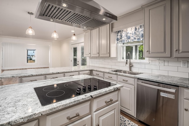 kitchen featuring dishwasher, black electric cooktop, backsplash, range hood, and sink