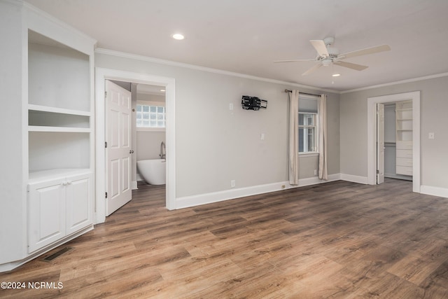 519 E Water St, Belhaven, NC 27810 - unfurnished bedroom with ornamental molding, recessed lighting, wood finished floors, connected bathroom, and a ceiling fan