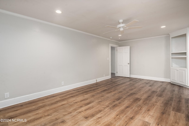 interior space with ceiling fan, hardwood / wood-style flooring, and crown molding