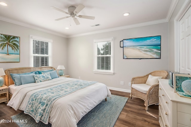 bedroom featuring dark wood-type flooring, ceiling fan, and crown molding