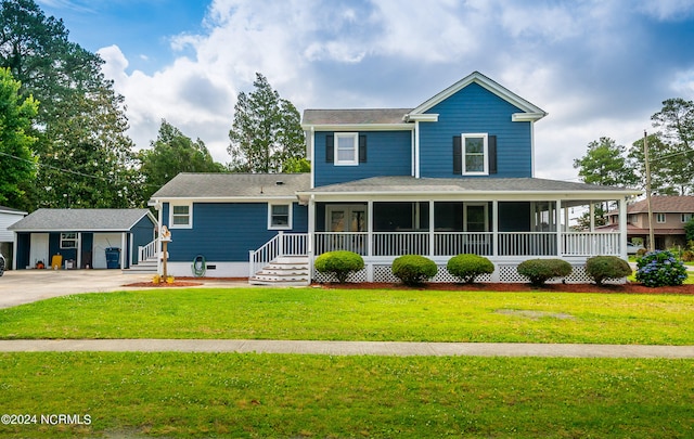 view of front of property featuring a porch, a front yard, and a garage