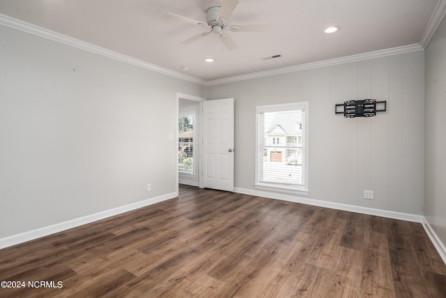 spare room featuring crown molding, hardwood / wood-style flooring, and ceiling fan