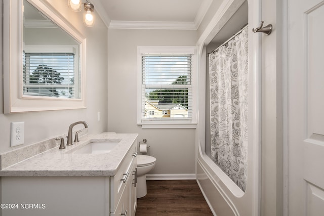 full bathroom featuring vanity, toilet, crown molding, and wood-type flooring