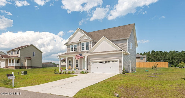 view of front of house with a garage and a front yard