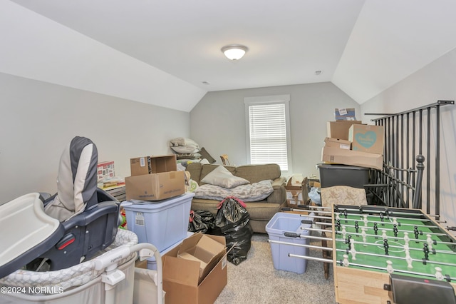 additional living space with lofted ceiling and carpet