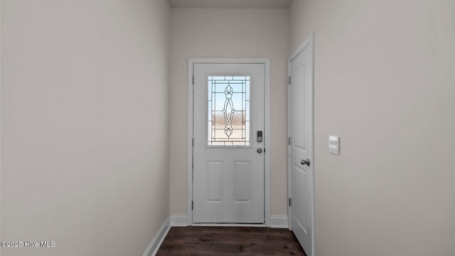 hallway with dark wood-type flooring