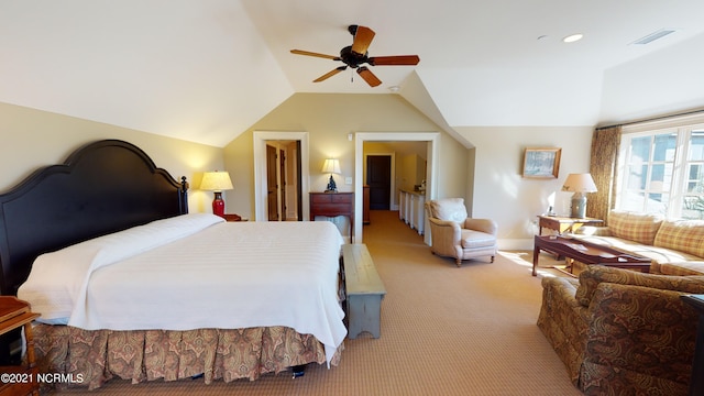 bedroom featuring lofted ceiling, ceiling fan, light colored carpet, visible vents, and baseboards