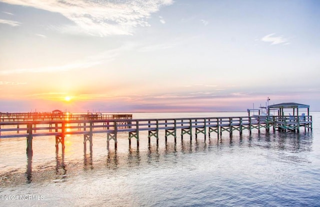 view of dock with a water view