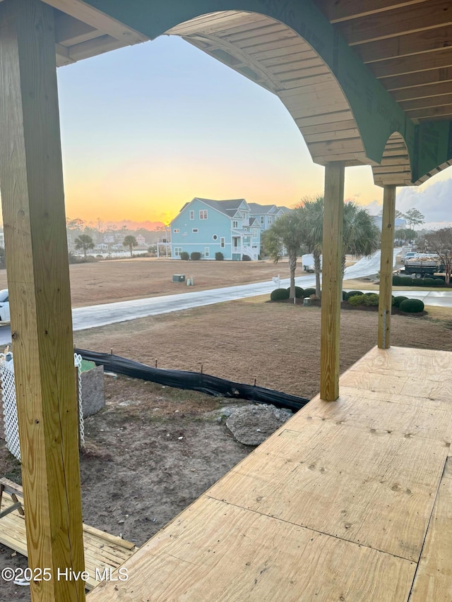 view of yard at dusk