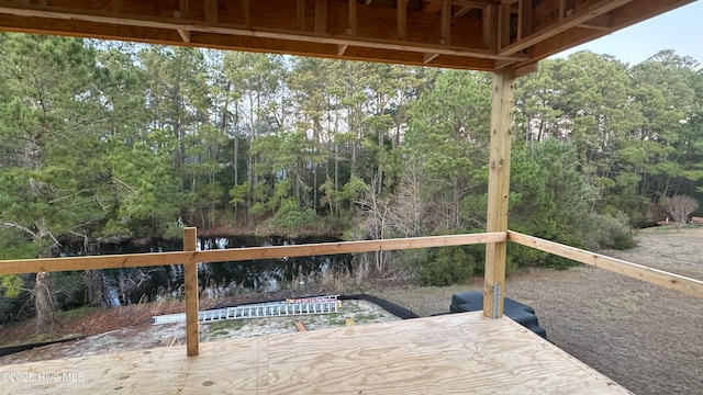 wooden terrace with a water view