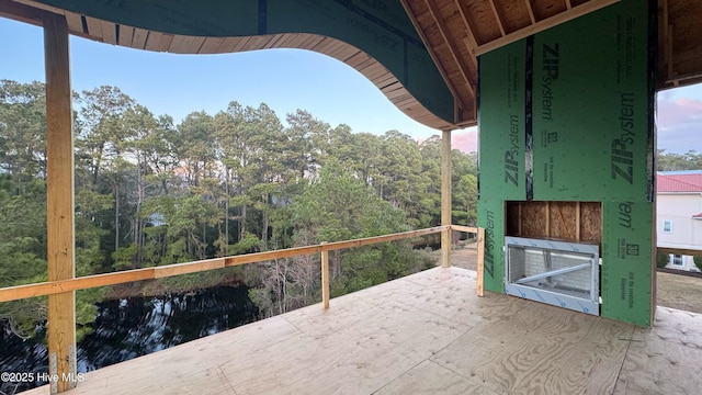 view of home's community featuring a water view and a lawn