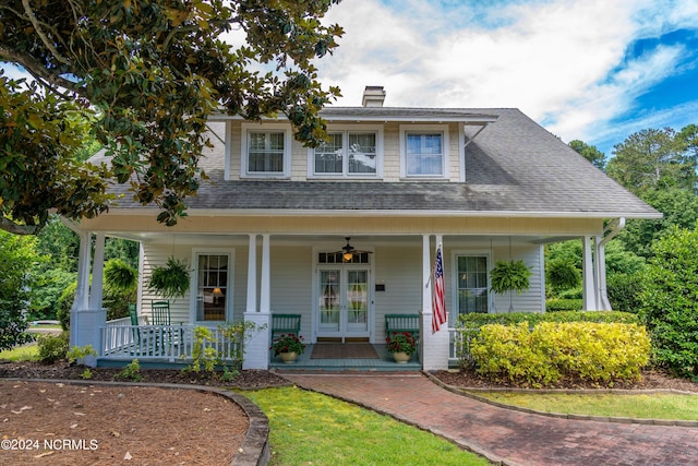 view of front of property with ceiling fan and covered porch