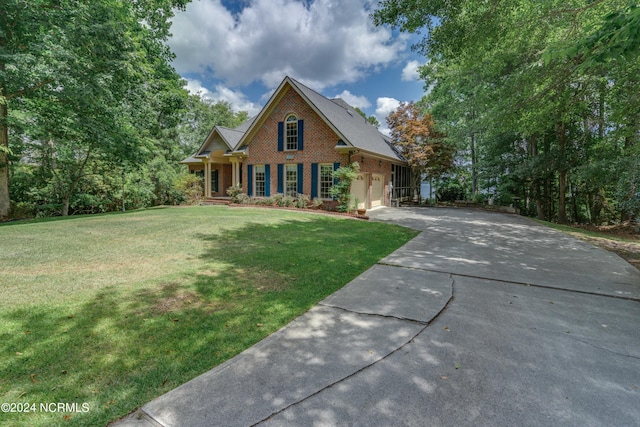 craftsman-style house with a garage, a front lawn, and a porch