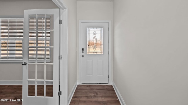 doorway featuring dark hardwood / wood-style flooring