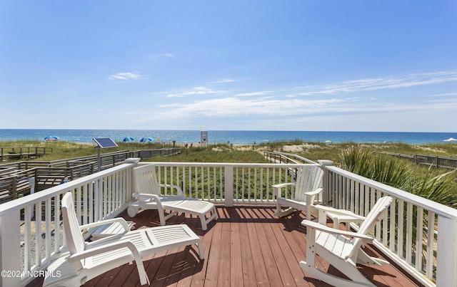 deck featuring a water view